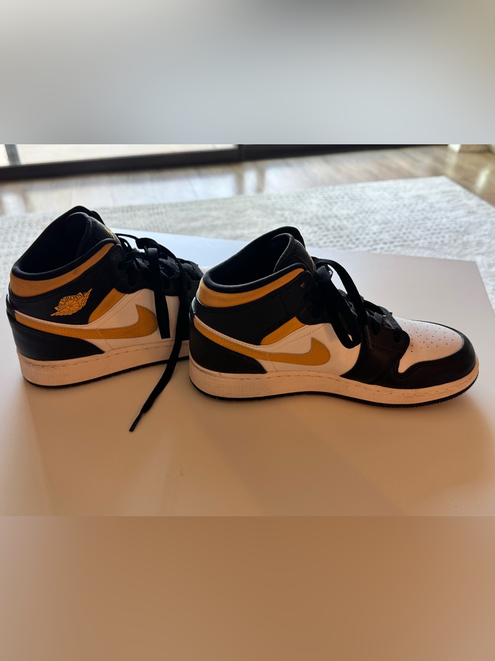 Black, White & Yellow High-Top Jordan Sneakers